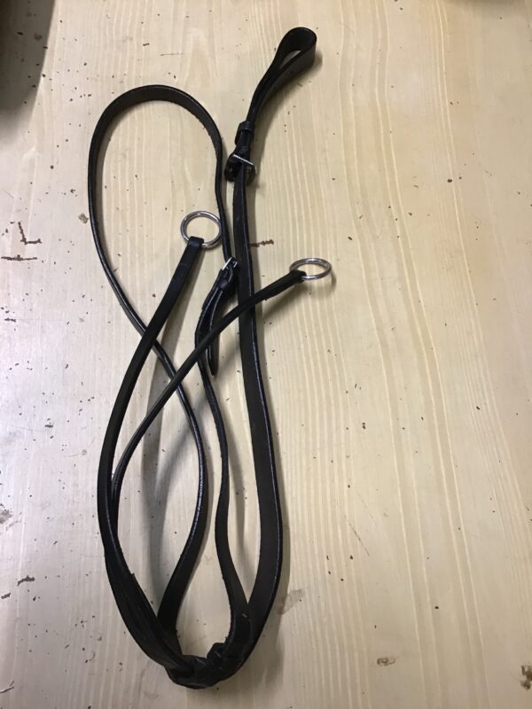 Black running martingale pony