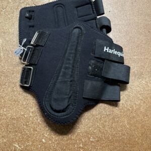 Harlequin brushing boots