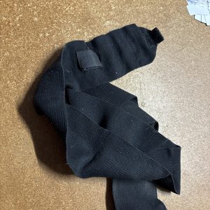 Black elastic tail bandage