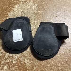 Black fetlock boots