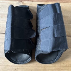 Large black hind boots