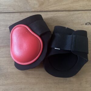 Full red and black fetlock boots