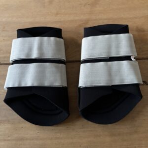 Small black brushing boots